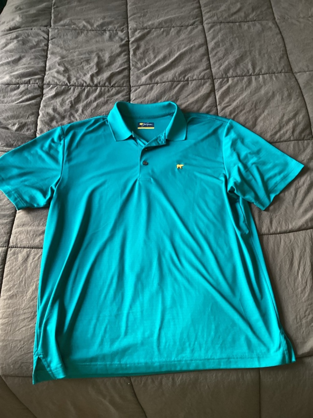 Jack Nicklaus Men's L Performance Polo in Teal with Golden Bear logo